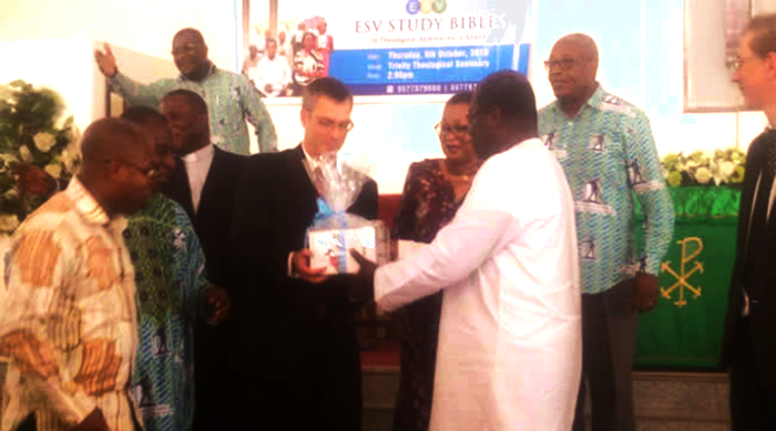  A representative of the Trinity Theological seminary receiving their Bibles. Among those in the picture is Rev.Dr. Joyce Aryee